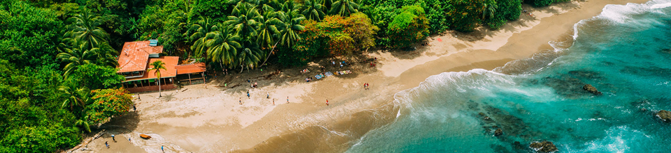 Tropical travel destination with a sandy beach and turquoise sea.